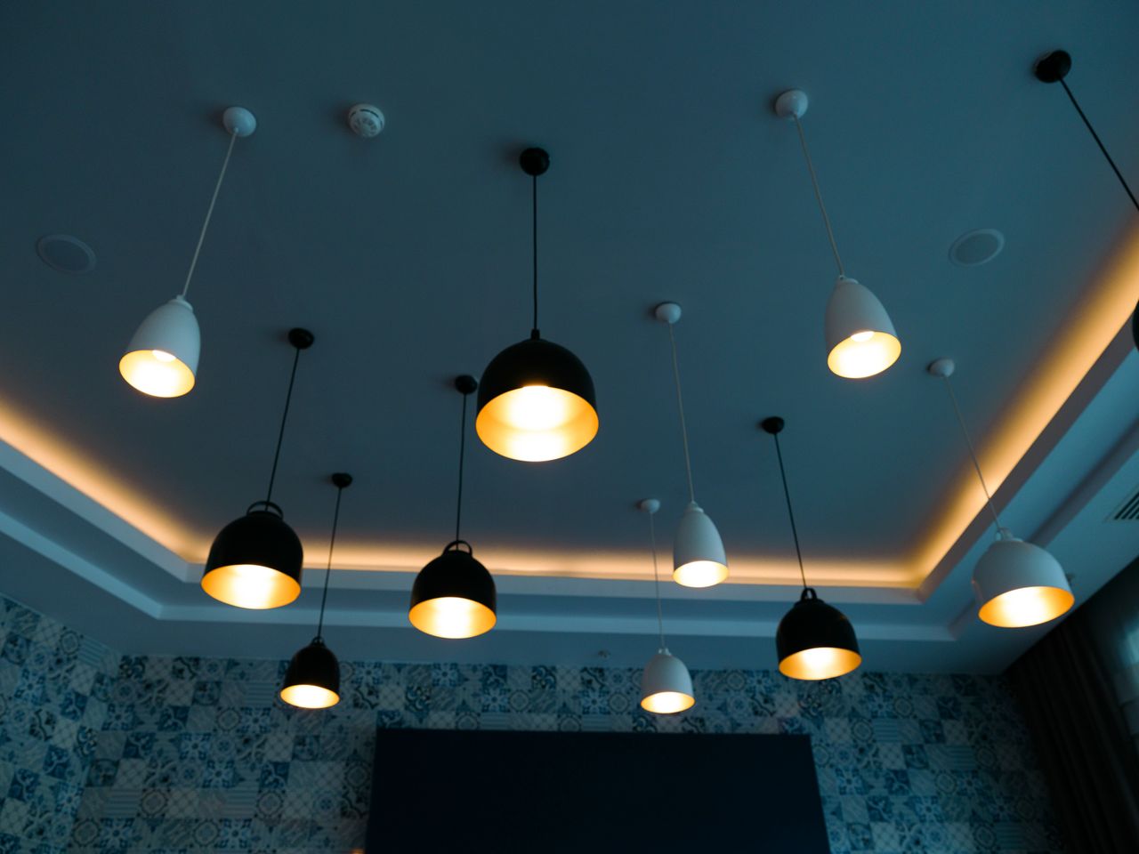 Stylish pendant lamps illuminate a modern interior with a chic, contemporary design.